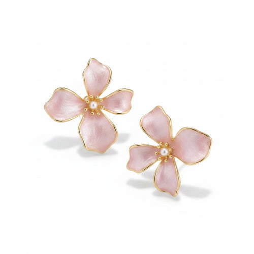 Pair of pink enamel cherry blossom four-petal stud earrings with gold-tone border outline, gold bead stamens and white pearl center, isolated on white background with soft drop shadow

