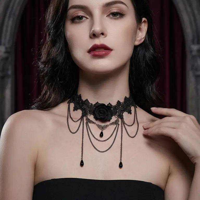 Woman with light skin tone and black wavy hair wearing gothic black lace rose choker necklace with multiple draped bronze chains and black teardrop bead drops, red lips, black strapless top, dark gothic arched hall with burgundy drape background, AI-generated model image
