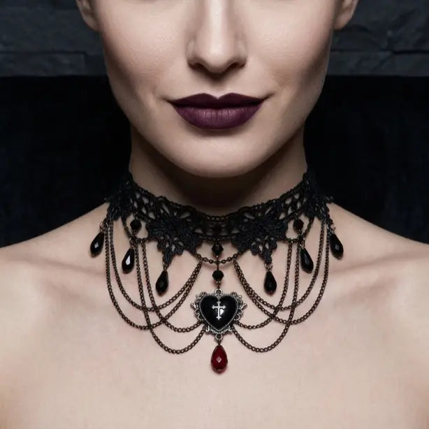 Woman with light skin tone wearing gothic black lace choker necklace with bronze draped chains, black teardrop beads and heart cross pendant with red crystal drop, deep burgundy lips, dark background, AI-generated model image — please verify this image matches the correct product