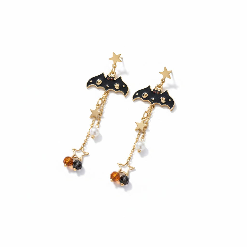 Pair of Halloween gold-tone alloy bat star beaded drop stud earrings: gold star stud top, gold double chain, black enamel bat pendant with skull ghost cross star relief, dual chain drops with gold star slider bead, white faux pearl, gold open star frame, and amber and black faceted crystal bead drops at bottom; isolated on white background with soft drop shadow

