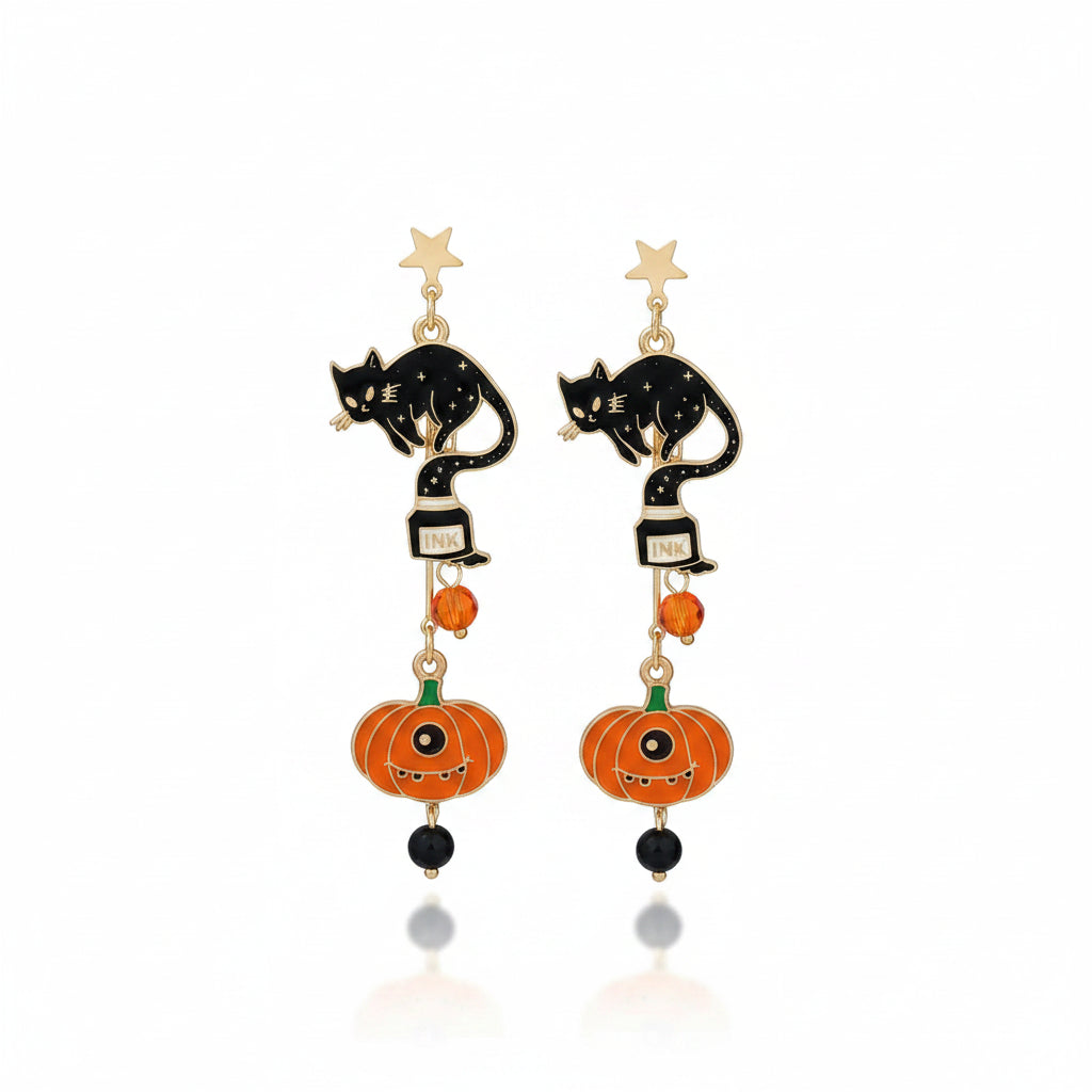 Pair of Halloween gold-tone alloy black cat pumpkin drop stud earrings: gold star stud top, gold chain, black enamel arched black cat pendant with star texture standing on black and white ink bottle, orange faceted crystal bead, orange enamel jack-o-lantern pumpkin pendant with green stem and string light relief, and black round bead drop; isolated on white background with soft drop shadow

