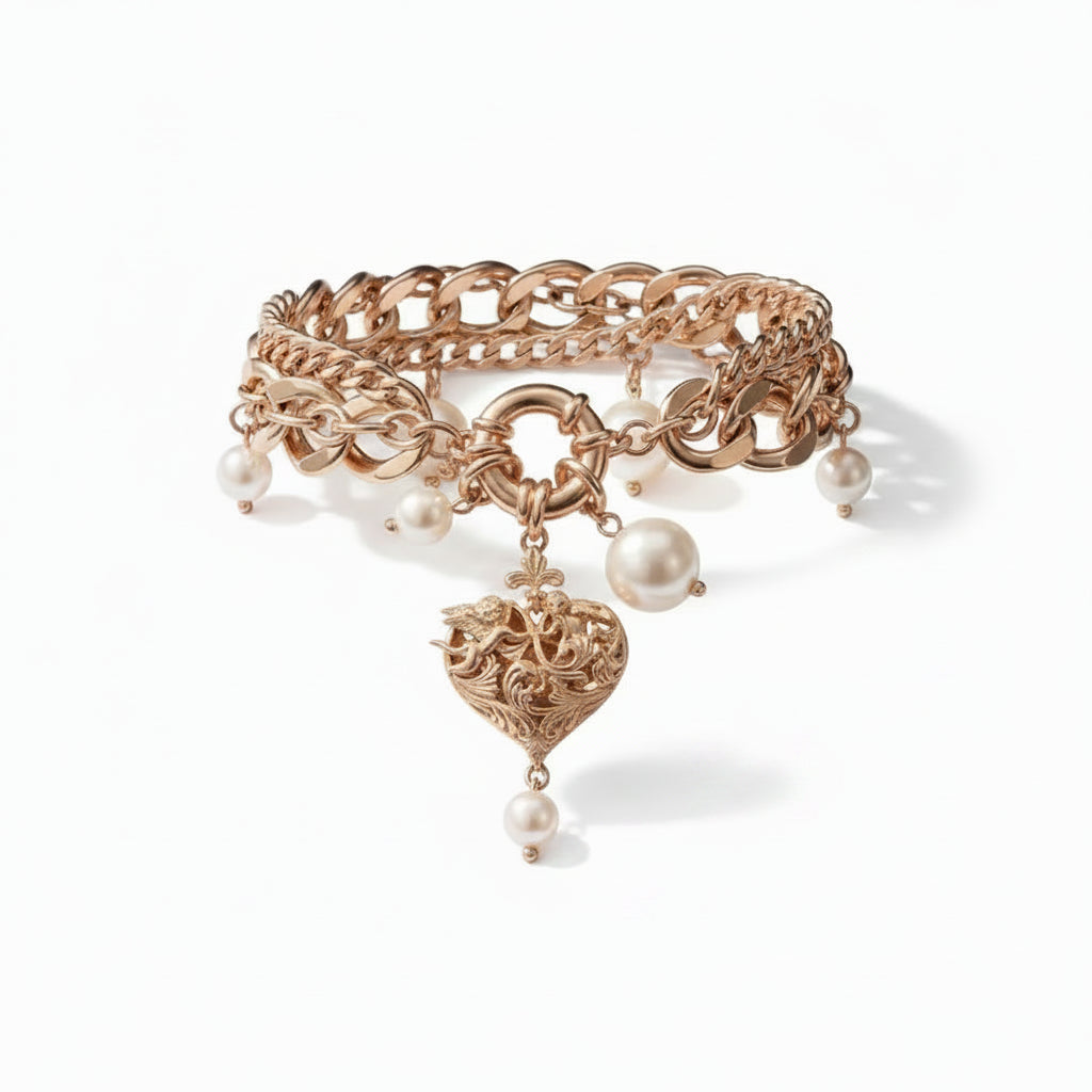 Vintage baroque rose gold-tone double-layer chain bracelet with large Cuban link and twisted rope chain, spring ring clasp, five white faux pearl bead drops, and rose gold baroque filigree cherub scrollwork heart charm pendant with single pearl drop; isolated on white background with soft drop shadow

